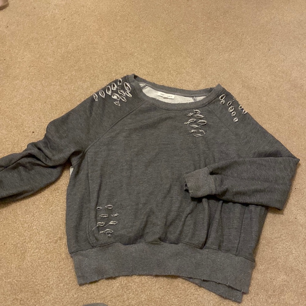 Really cute oversized ripped honey punch sweater